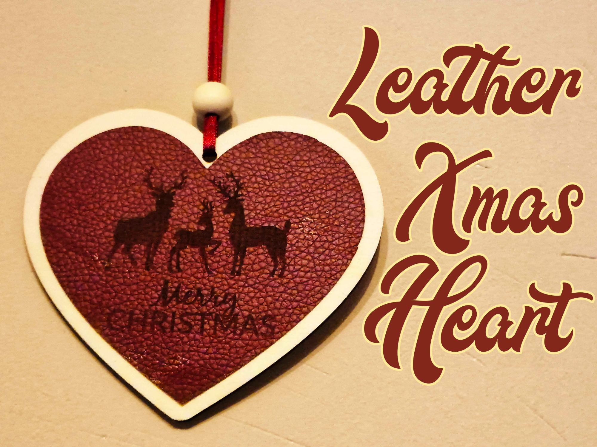 Leather Christmas heart ornament with engraved detail