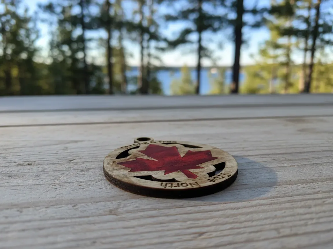 Rustic maple leaf ornament cut from natural wood