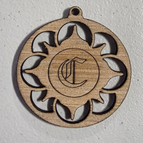 [Laser cut and engrave] Laser Cut Wooden Sun Ornament with Engraved Letter C