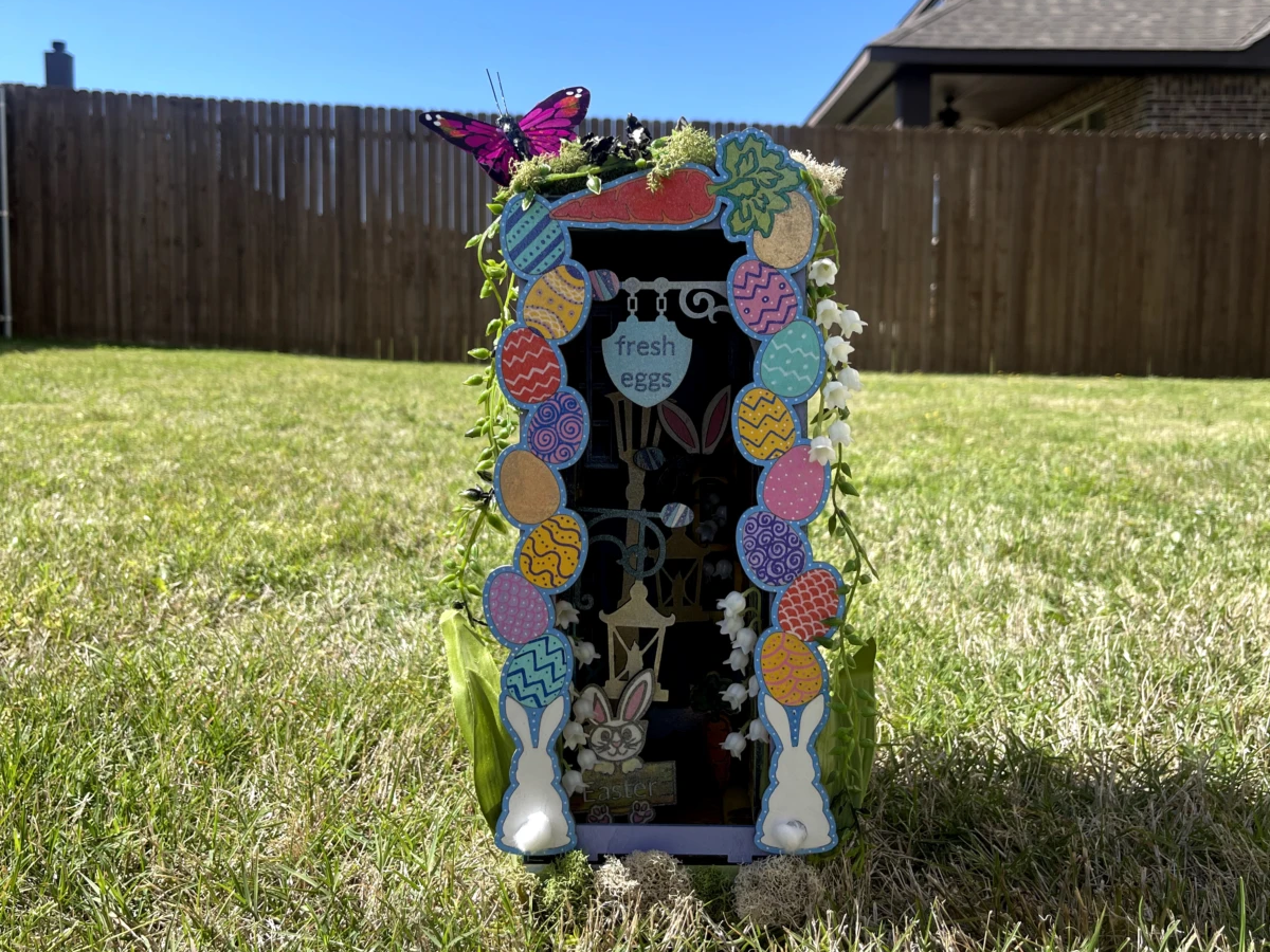 Easter book nook 3D layered shelf insert diorama ringed with pastel eggs and a bunny