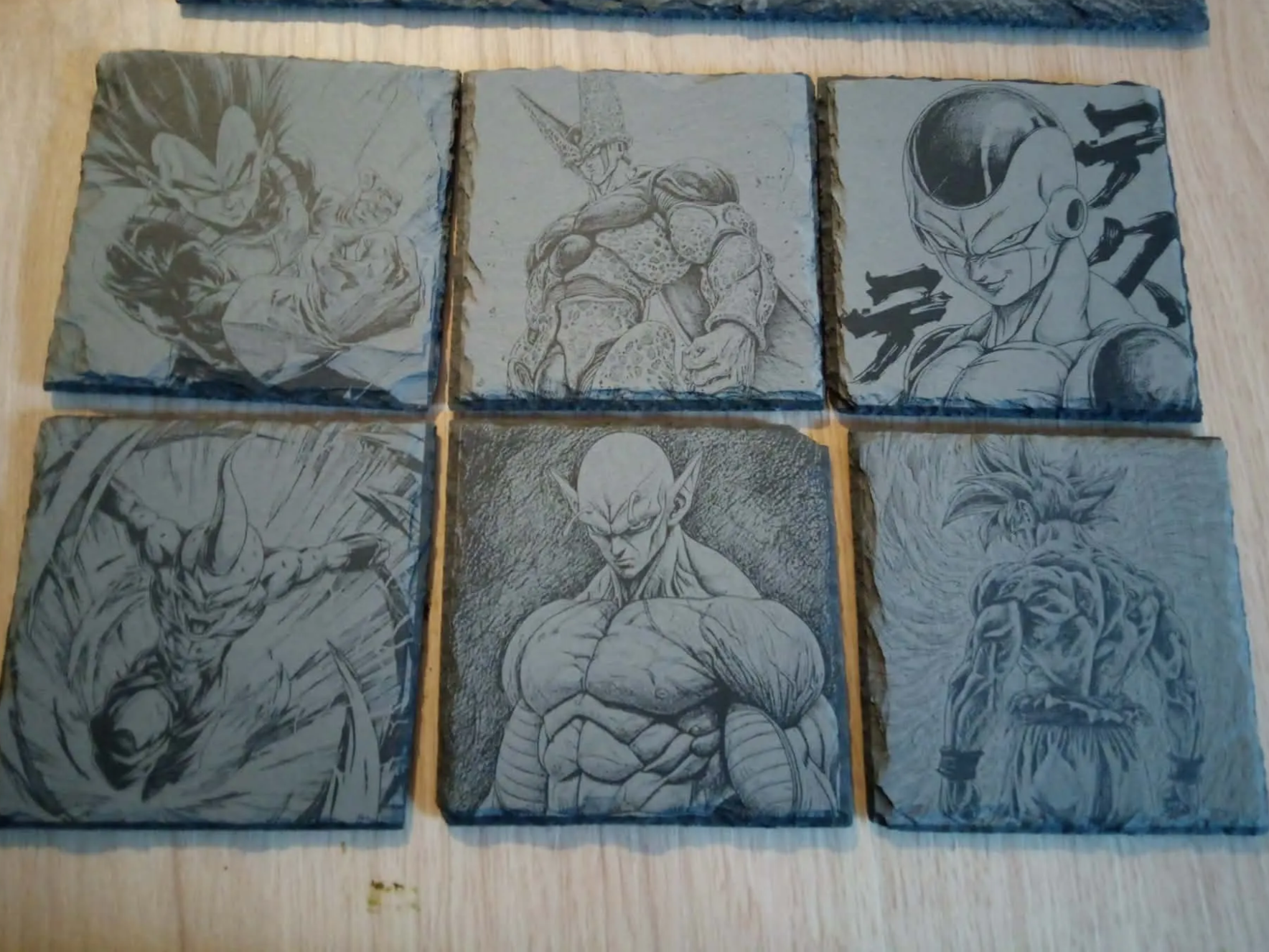 Set of Dragon Ball Z anime character portraits on slate coasters