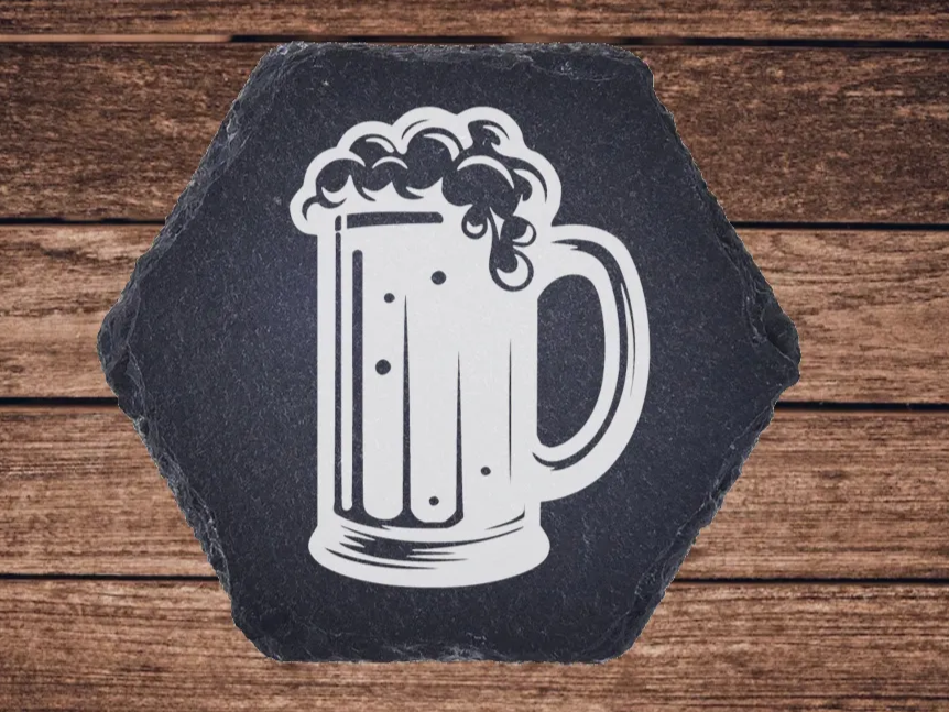 Hexagon shaped slate coaster engraved with a beer mug design