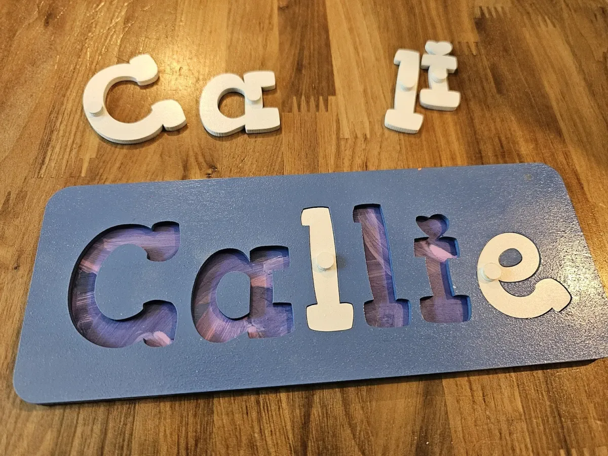 Name Puzzle with Peg Knobs laser cut word puzzle idea