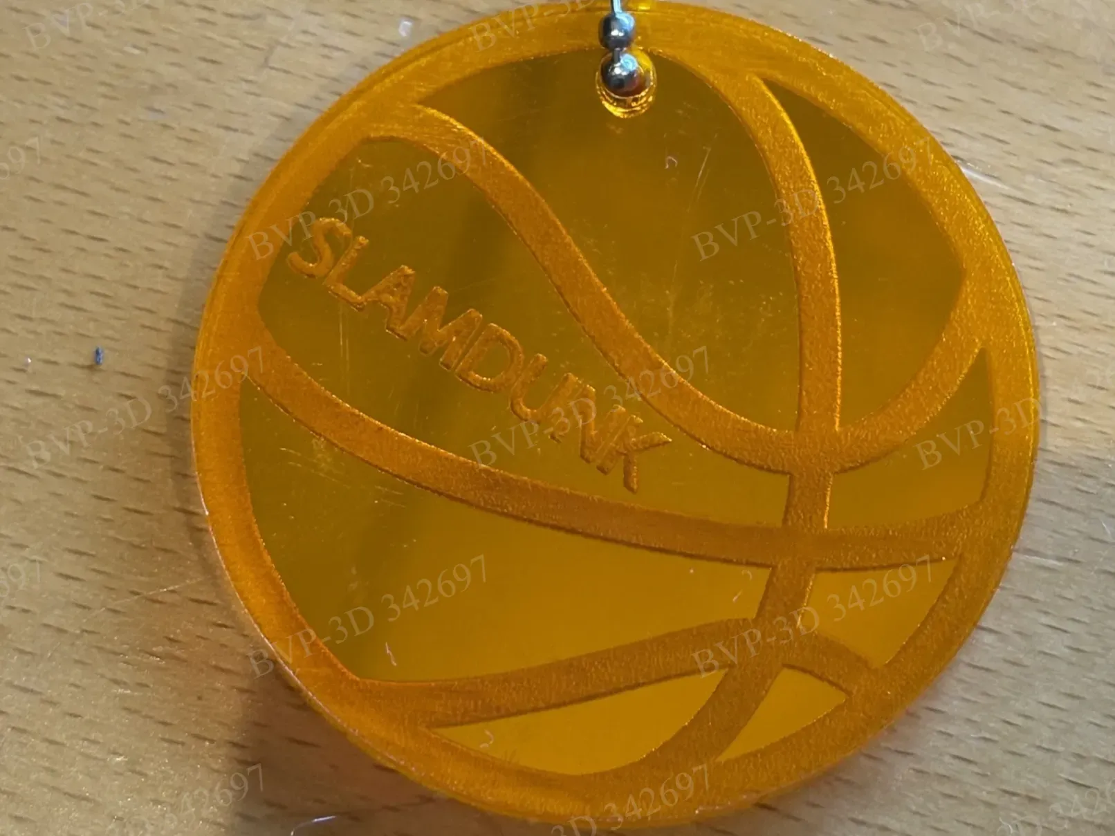 keychain of a basketball, with club moon and player name sports keychain design