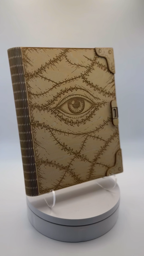 [Laser cut and engrave] 3D Engraved Stitched Look Magic Spell Book with All-Seeing Eye Motif - Hocus Pocus Creepy Grimore Design