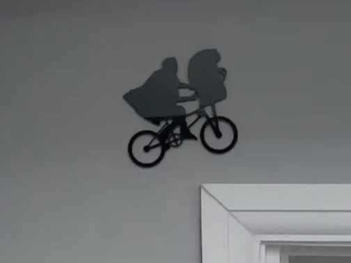 E.T. and Elliott on a bicycle silhouette decor