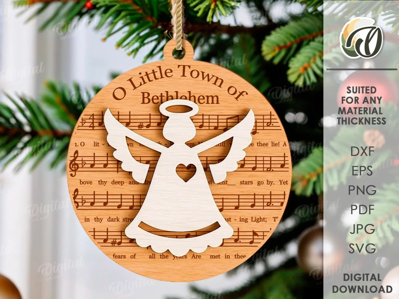 A wooden angel ornament layered over engraved Christmas sheet music