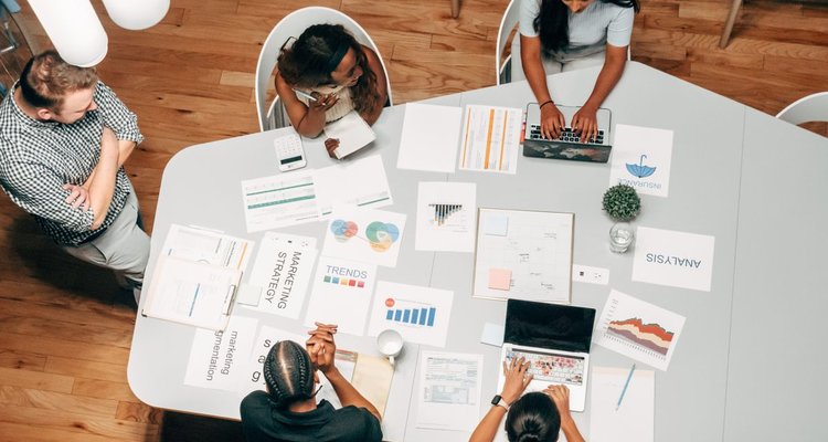 A team reviewing a marketing strategy with charts