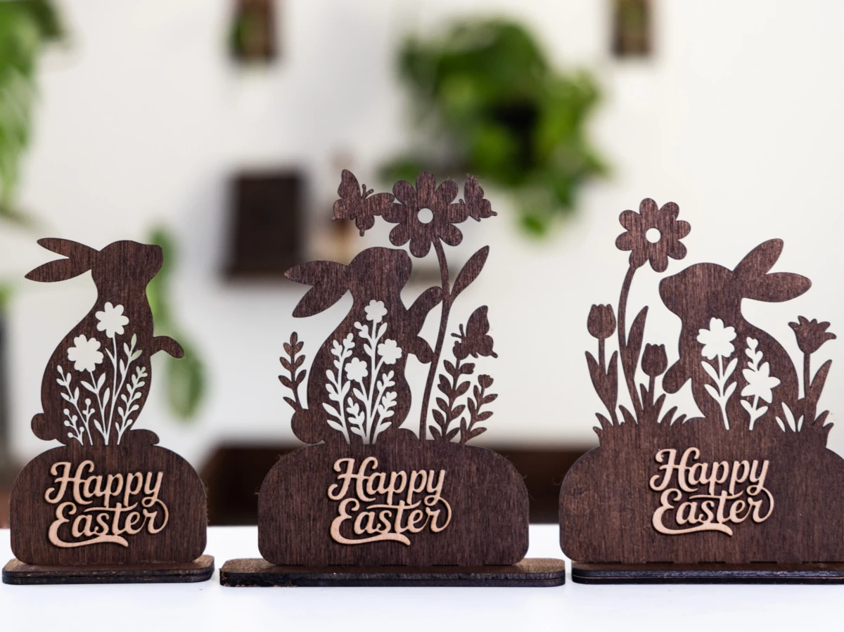 Laser-cut plywood Happy Easter signs with bunnies and flowers