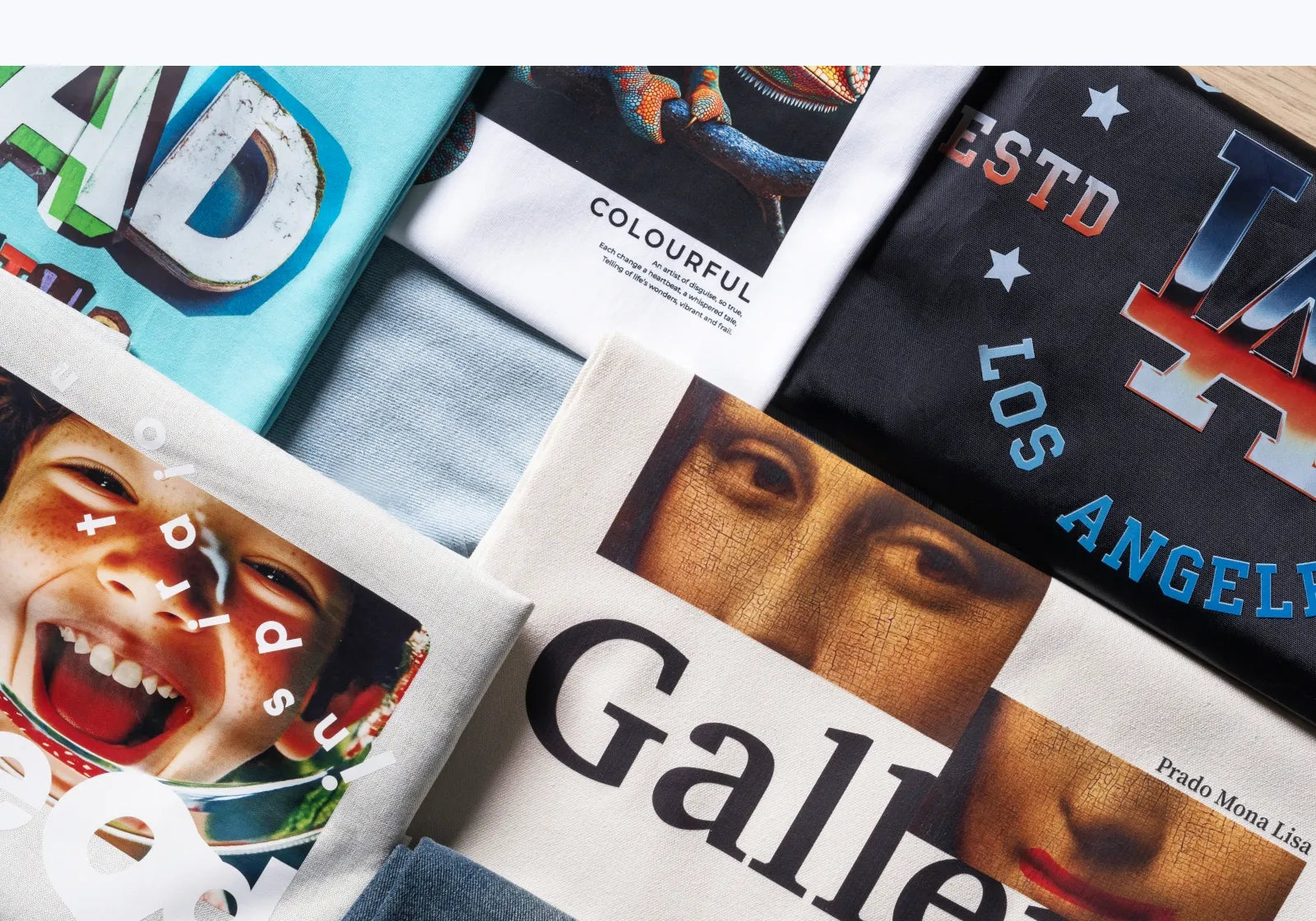 A range of full-color DTF designs printed on shirts and apparel